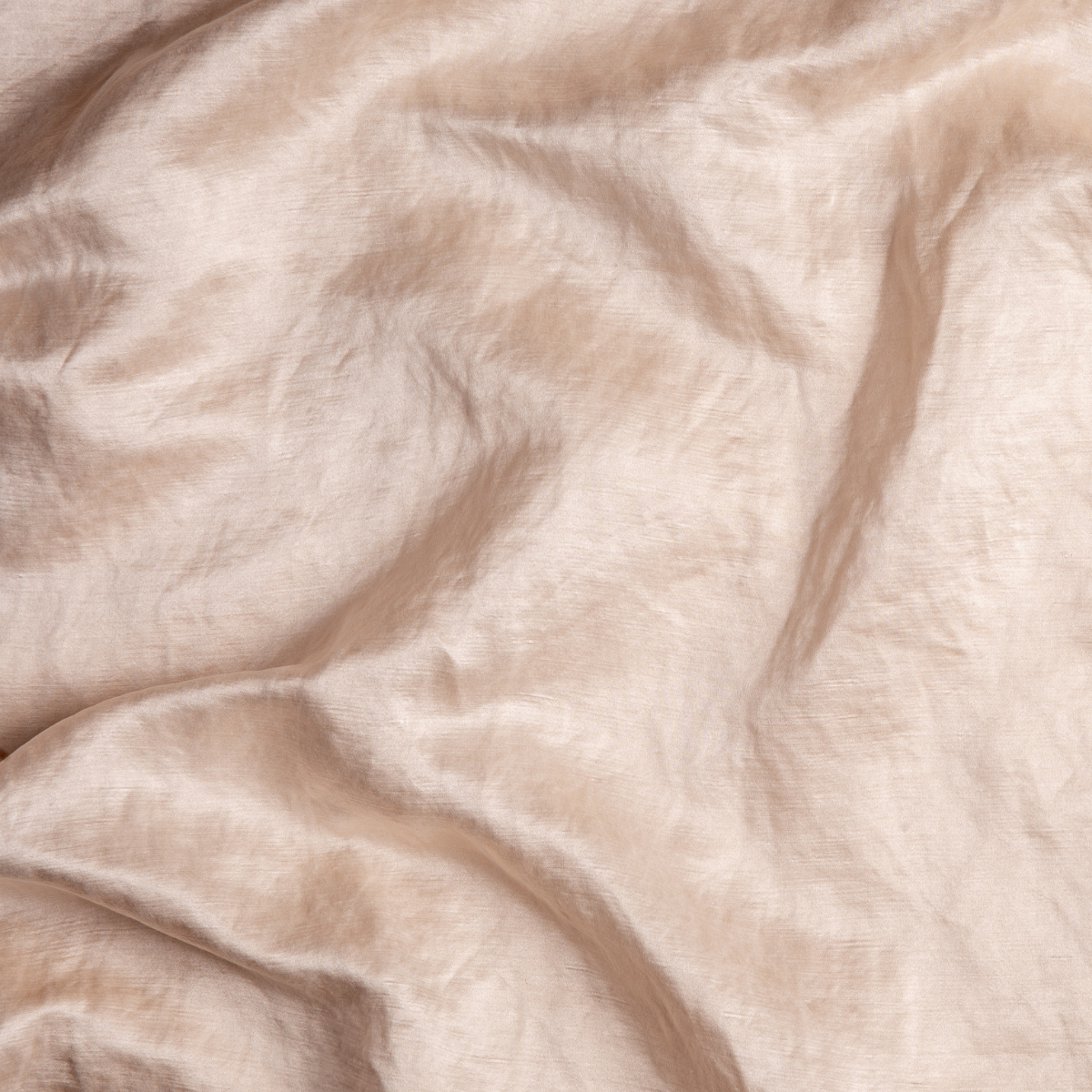 Close-up of Pearl Bella Notte Paloma pillowcase showing soft linen weave and natural drape.