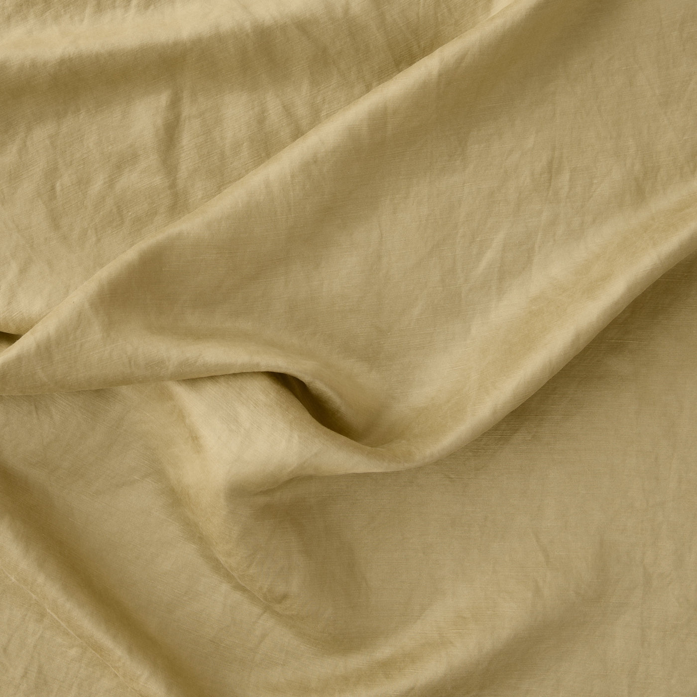 Draped Honeycomb linen fabric detail showing soft folds and natural texture.