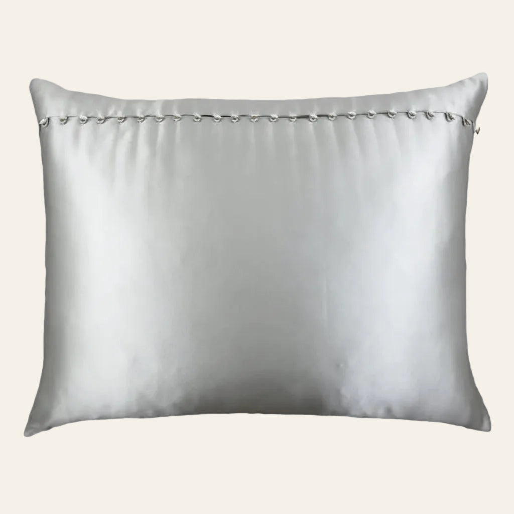 Ann Gish Charmeuse sham in silver with delicate French knot trim detail along top edge.