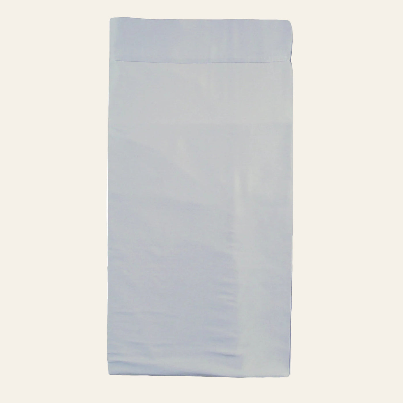Ann Gish Charmeuse tailored bed skirt in pale blue, folded flat on neutral background.