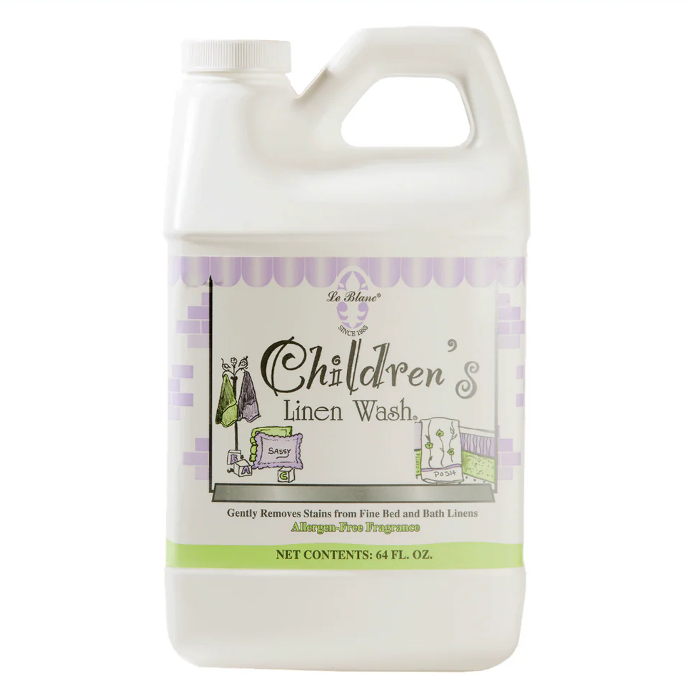 A 64 fl. oz. Le Blanc Children's Wash | Linen Wash in a plastic bottle with handle, labeled allergen-free and ideal for washing fine bed and bath linens.