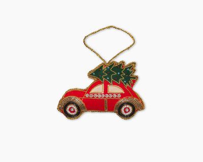 Henry Handwork red embroidered car ornament with green Christmas tree and gold trim detailing.