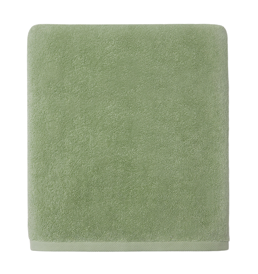 Sferra Cielo bath sheet in sage green terry cotton, folded flat.