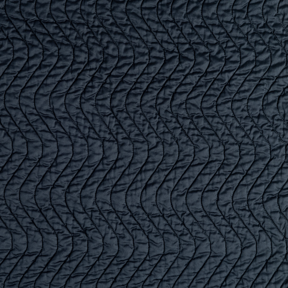 Close-up of Slate quilted wave stitching on Bella Notte Cirillo sham.
