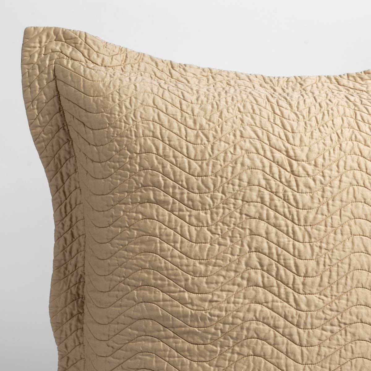 Close-up of Bella Notte Cirillo sham corner in Honeycomb with wave quilting detail.