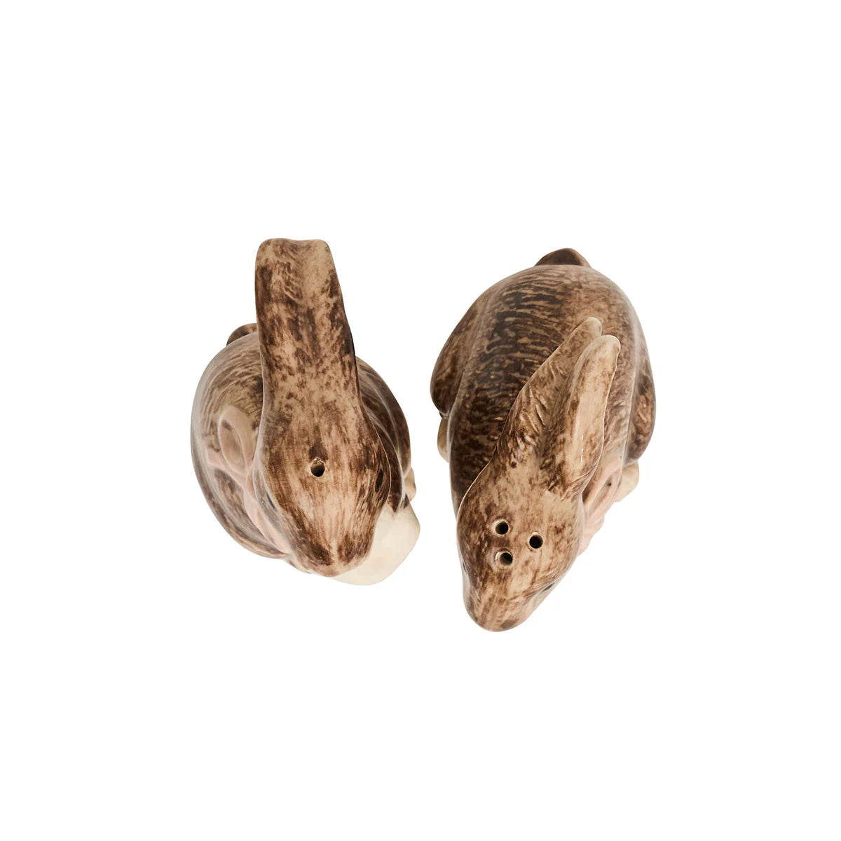 Underside view of Juliska ceramic bunny shakers showing salt and pepper holes.