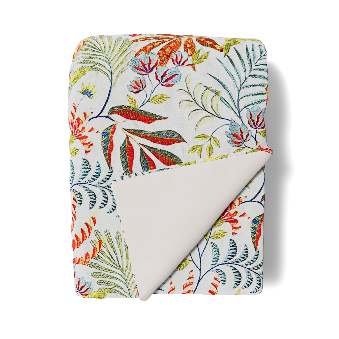 Ann Gish Cloud throw folded to reveal ivory reverse, multicolor tropical leaf print on face.