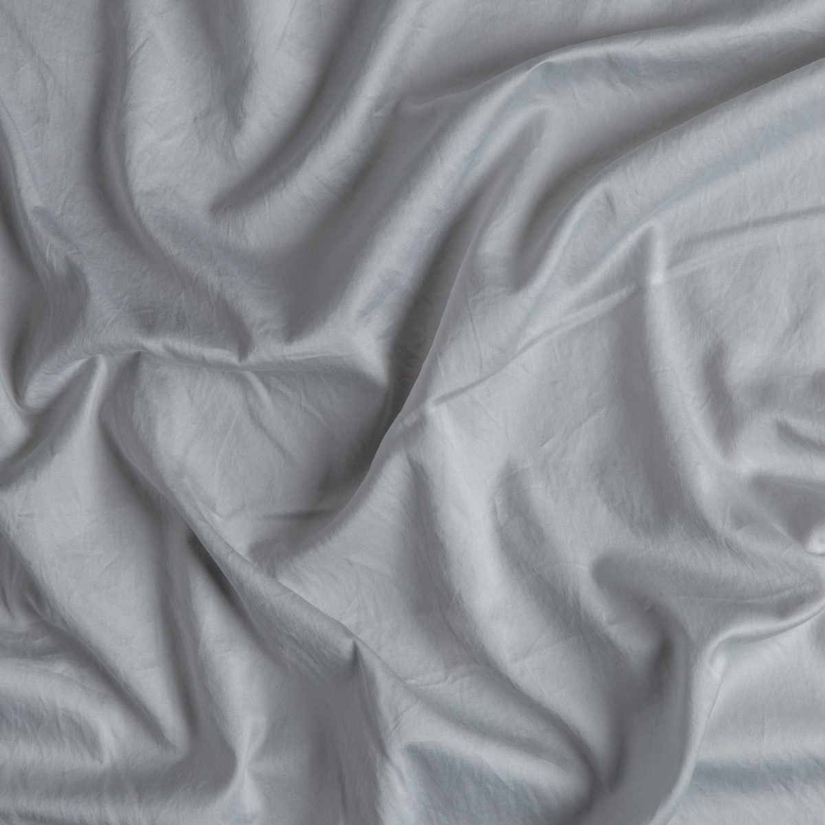 Softly draped Cloud fabric, showing smooth texture and natural creasing of the linen-cotton blend.