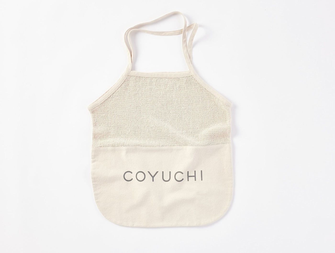 Coyuchi Conserve tote bag in natural, mesh top panel with canvas pocket and logo.