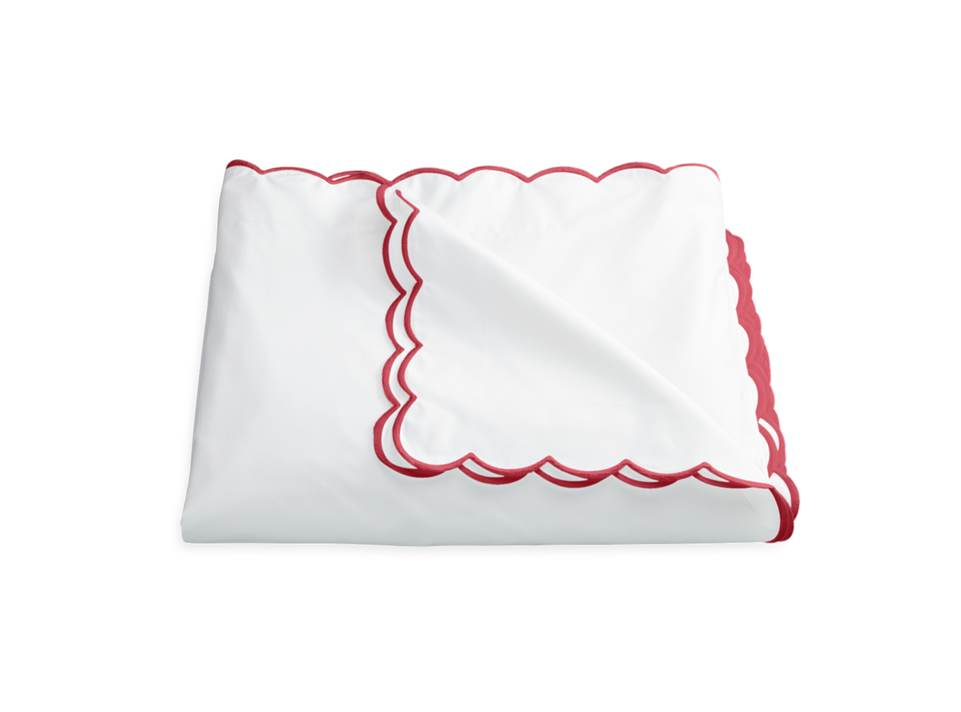 Matouk Dakota duvet cover in white with crimson scalloped border, neatly folded.
