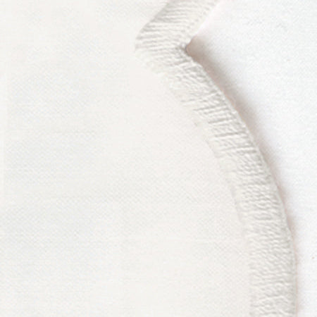 Close-up of ivory Dakota sham showing scalloped embroidered edge detail.