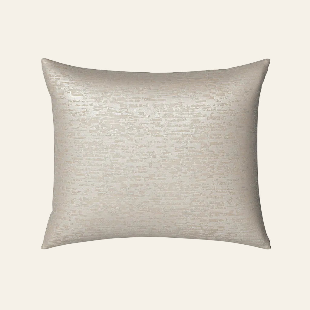 Ann Gish Delphi pillow in ivory with subtle metallic shimmer texture.