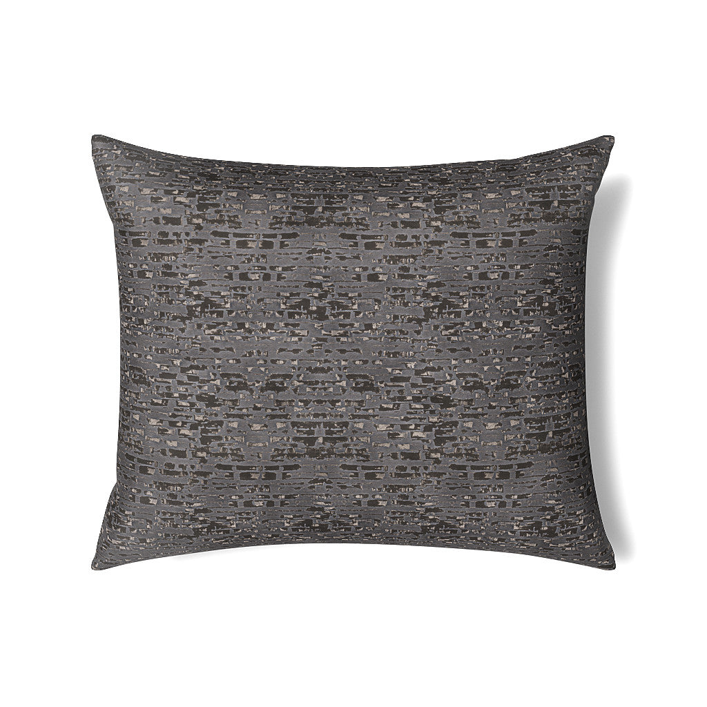 Ann Gish Delphi pillow in charcoal, showing textured mosaic weave pattern across face.