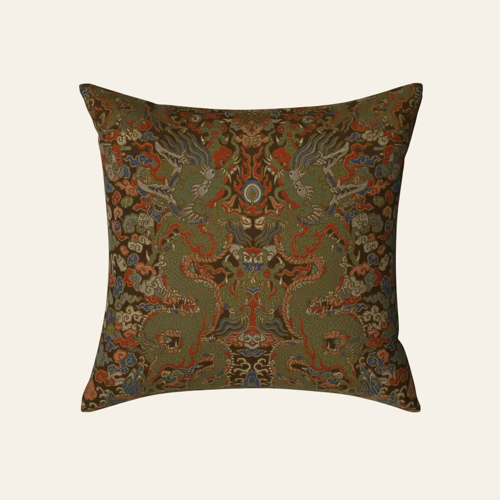Ann Gish Dragon pillow in olive green with intricate red and blue dragon motif.