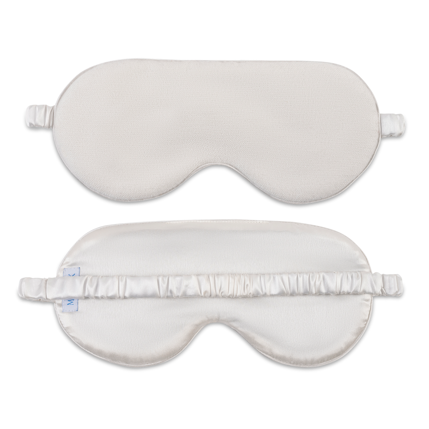 Front and back views of the Matouk Dream Modal sleep mask in ivory.