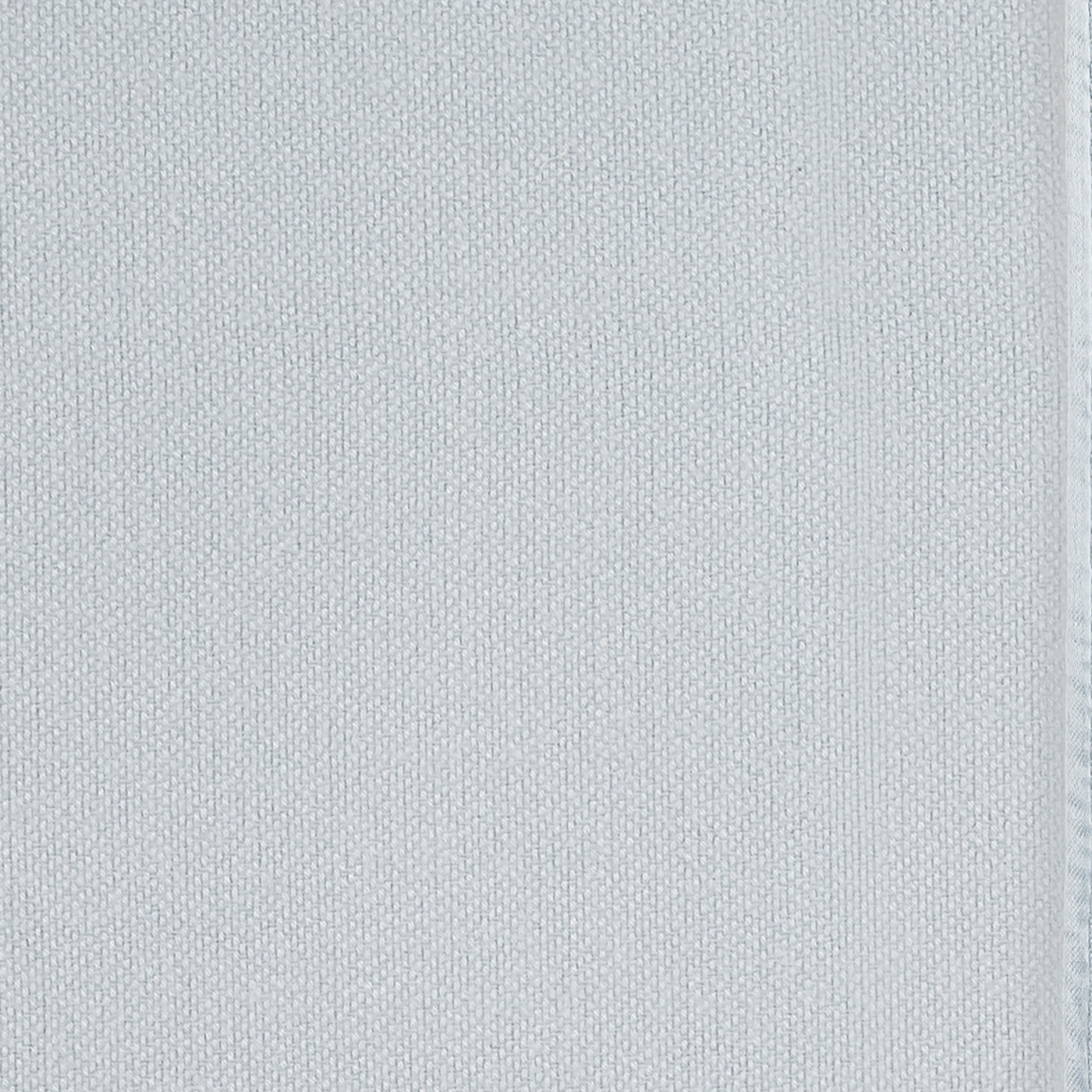 Close-up of mist blue modal fabric texture with subtle woven weave detail.