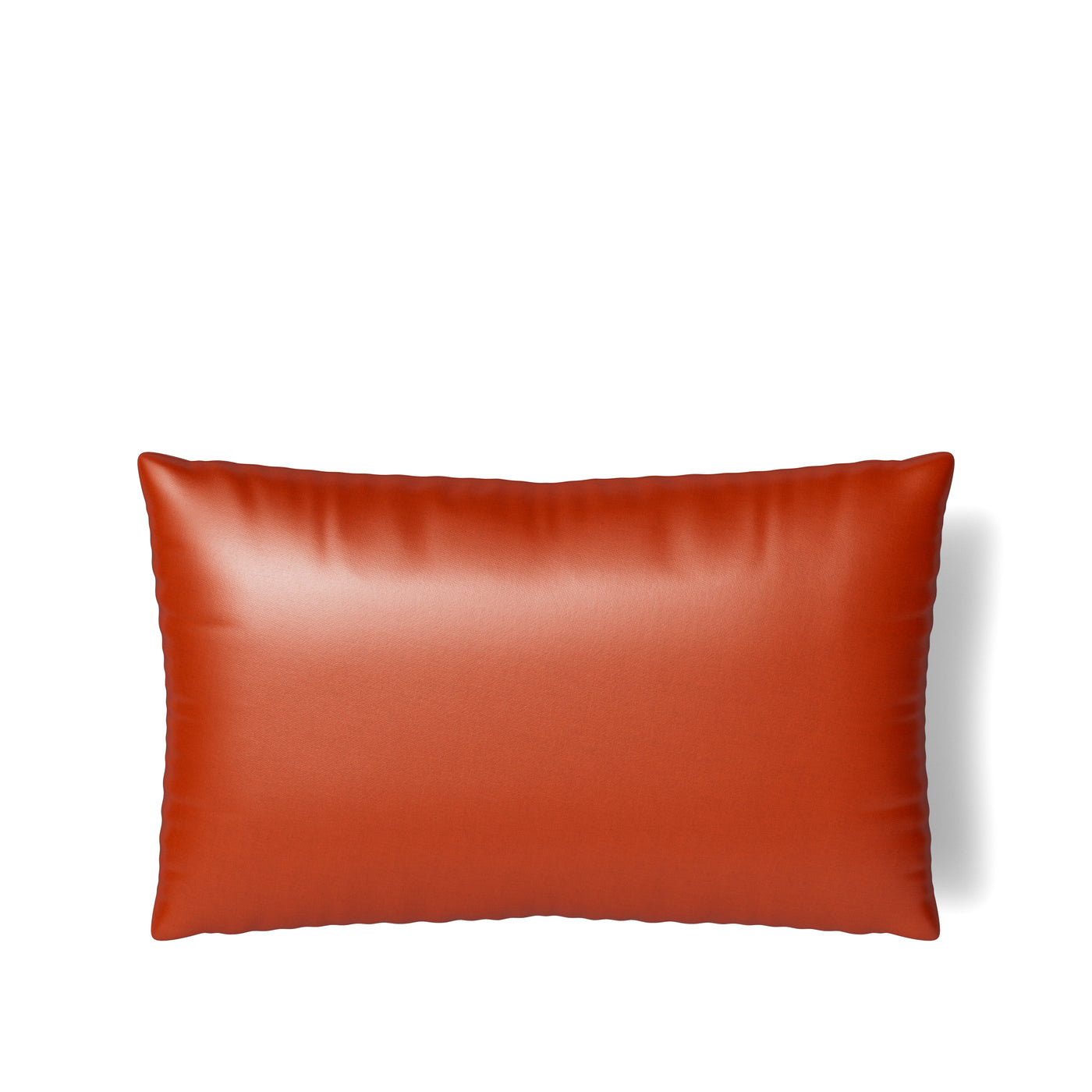 Ann Gish Duchess pillow in terracotta, smooth satin finish, lumbar shape on white background.