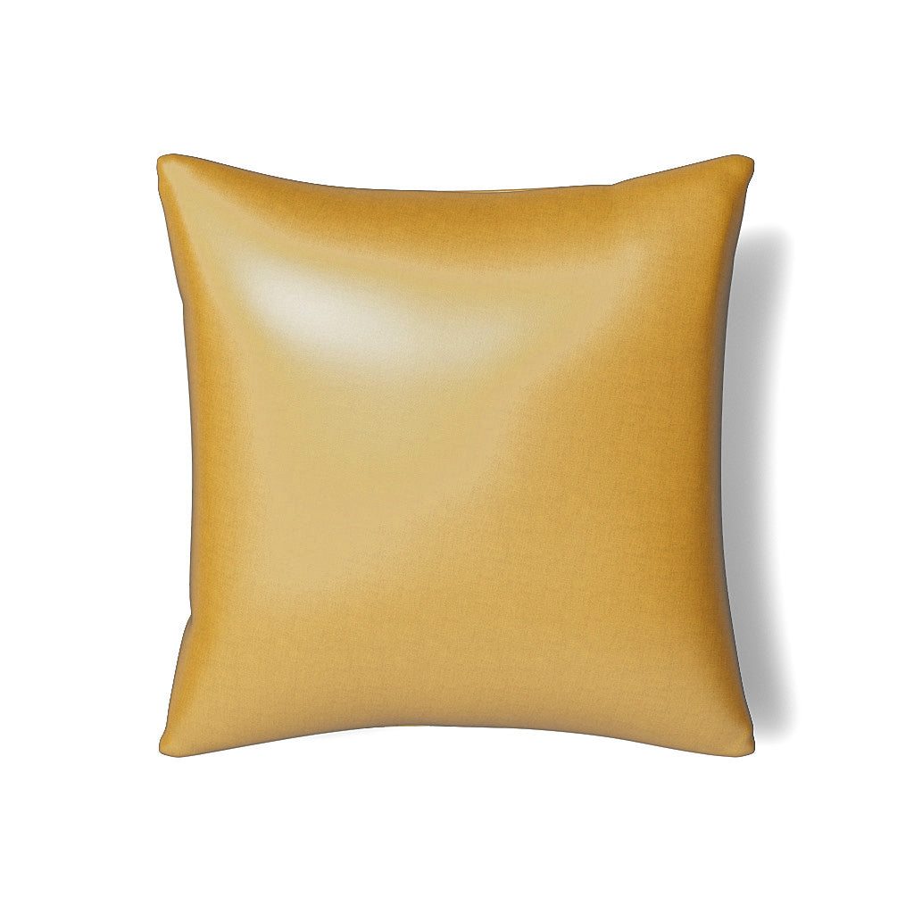 Close-up of Ann Gish Duchess pillow in amber gold with subtle sheen.
