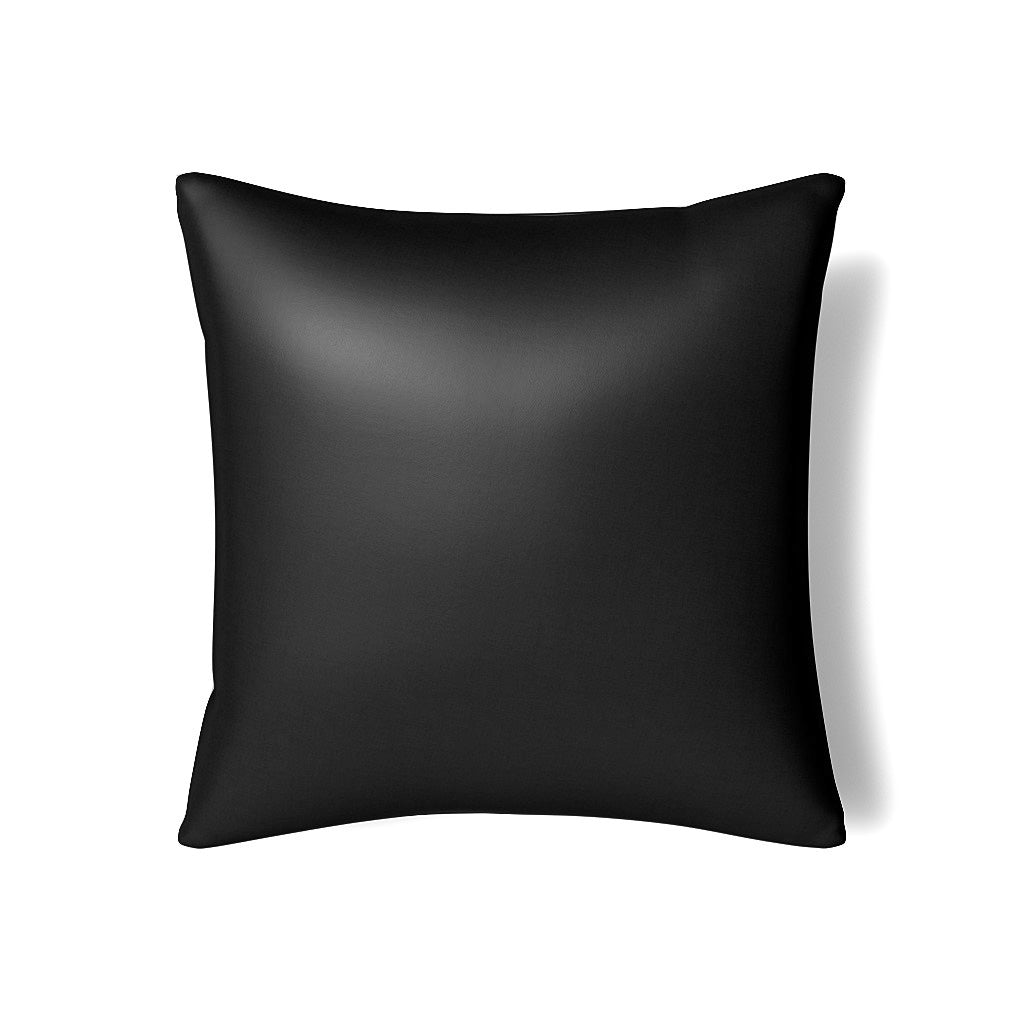 Close-up of Ann Gish Duchess pillow in black with smooth satin sheen.
