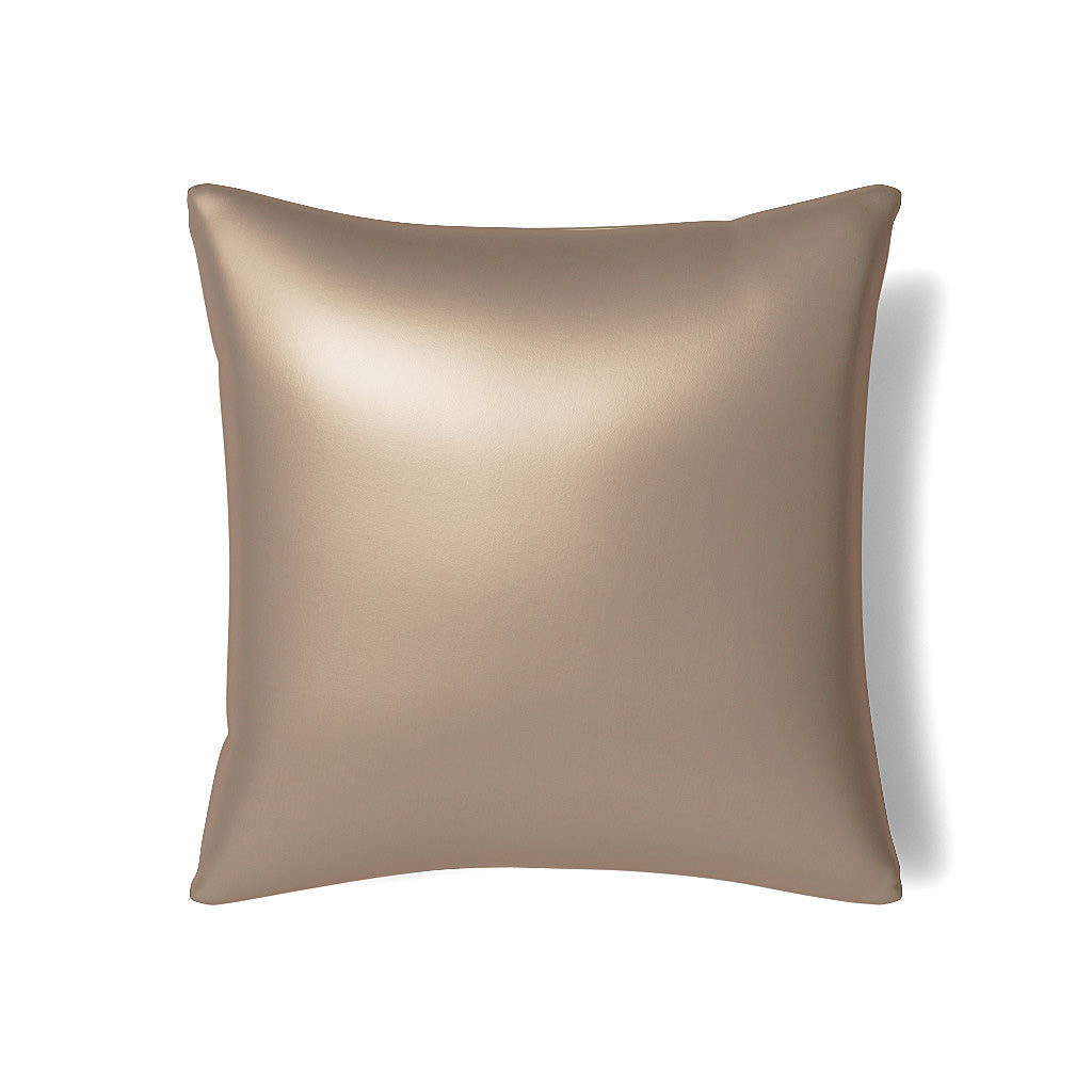Ann Gish Duchess pillow in champagne satin, overhead flat lay view.