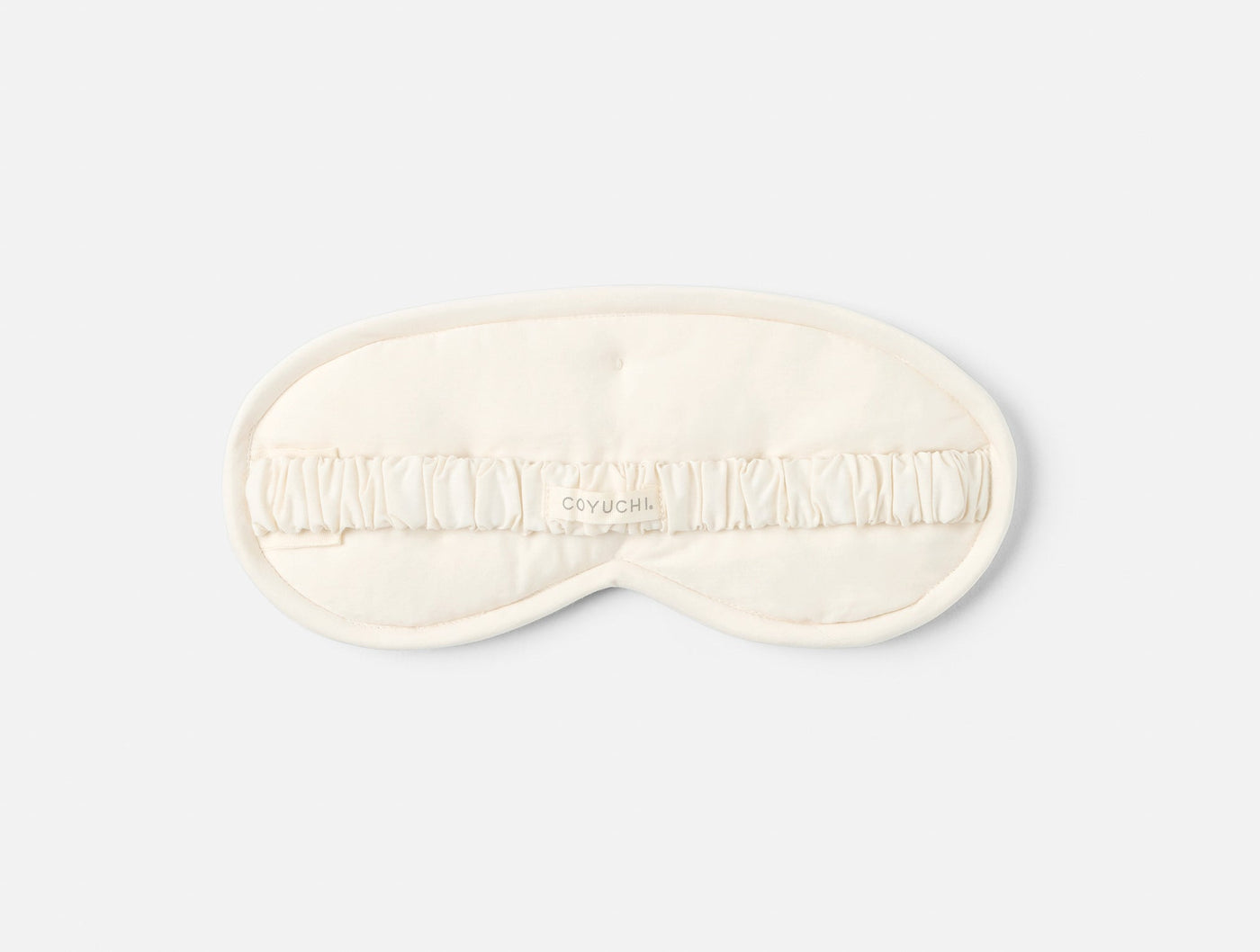 Coyuchi Cloud Soft Sateen eye mask reverse side showing ivory quilted fabric detail.