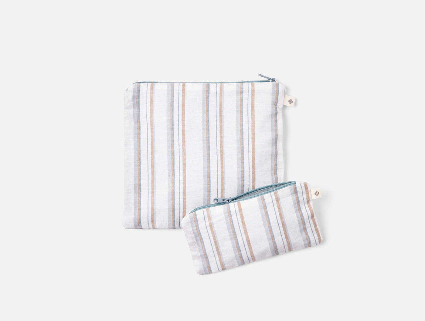 Coyuchi Conserve snack bag set, two sizes, ivory linen with tan and blue stripes.