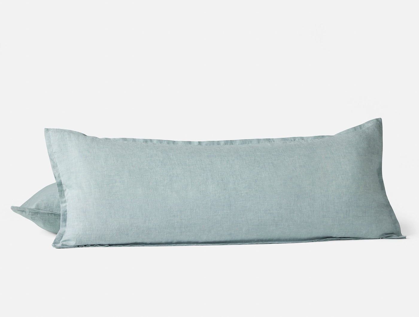 Coyuchi Relaxed Linen body pillow cover in mist blue, two pillows stacked, textured linen weave.