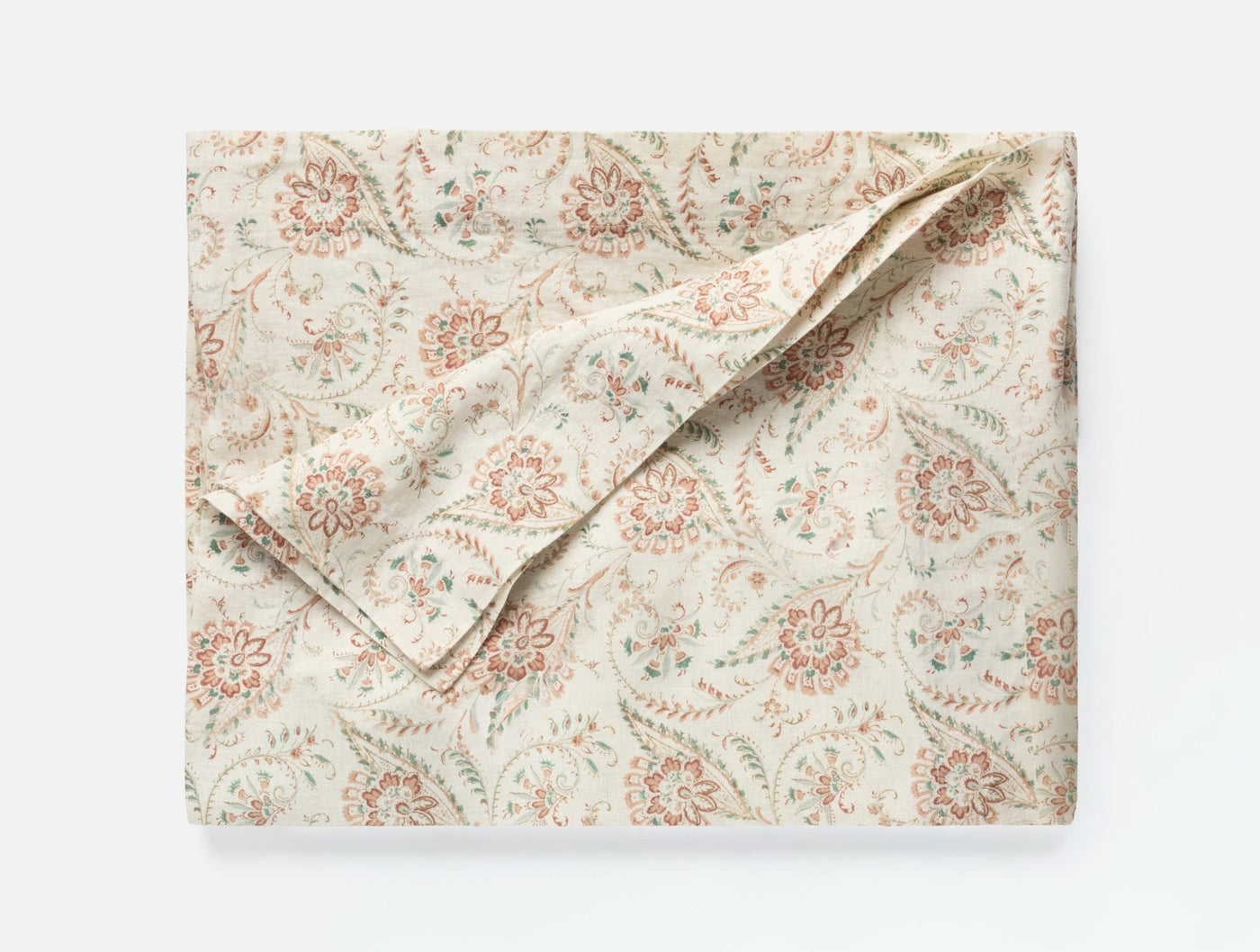 Coyuchi Ponderosa Print tablecloth folded flat, ivory with coral and sage floral print.