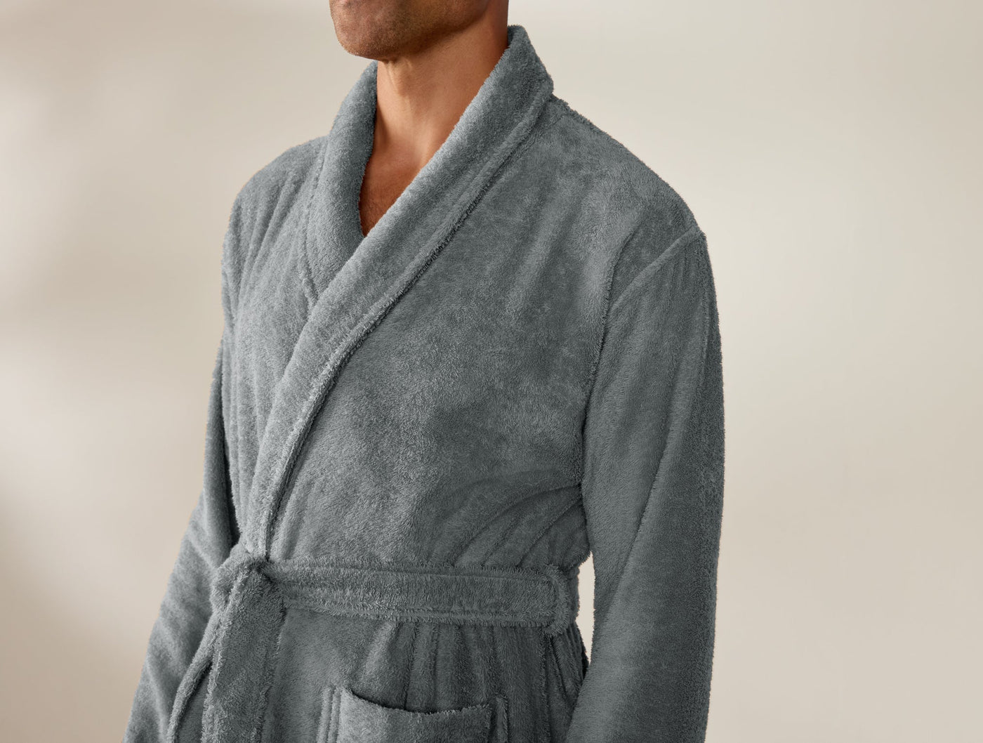 Close-up of Coyuchi Cloud Loom robe in slate, showing shawl collar and belted waist.