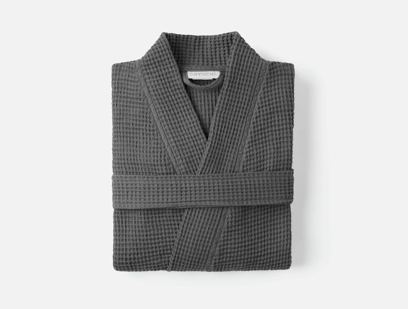 Coyuchi Unisex Waffle Robe in slate, folded flat, showing waffle texture and shawl collar.