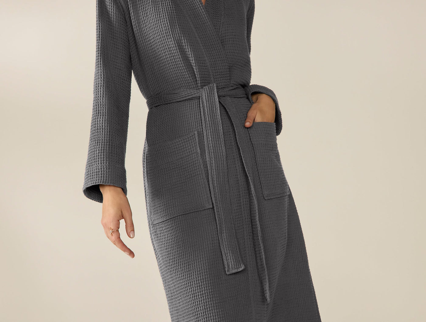 Slate grey waffle-knit robe with belted waist and patch pockets, mid-length view.