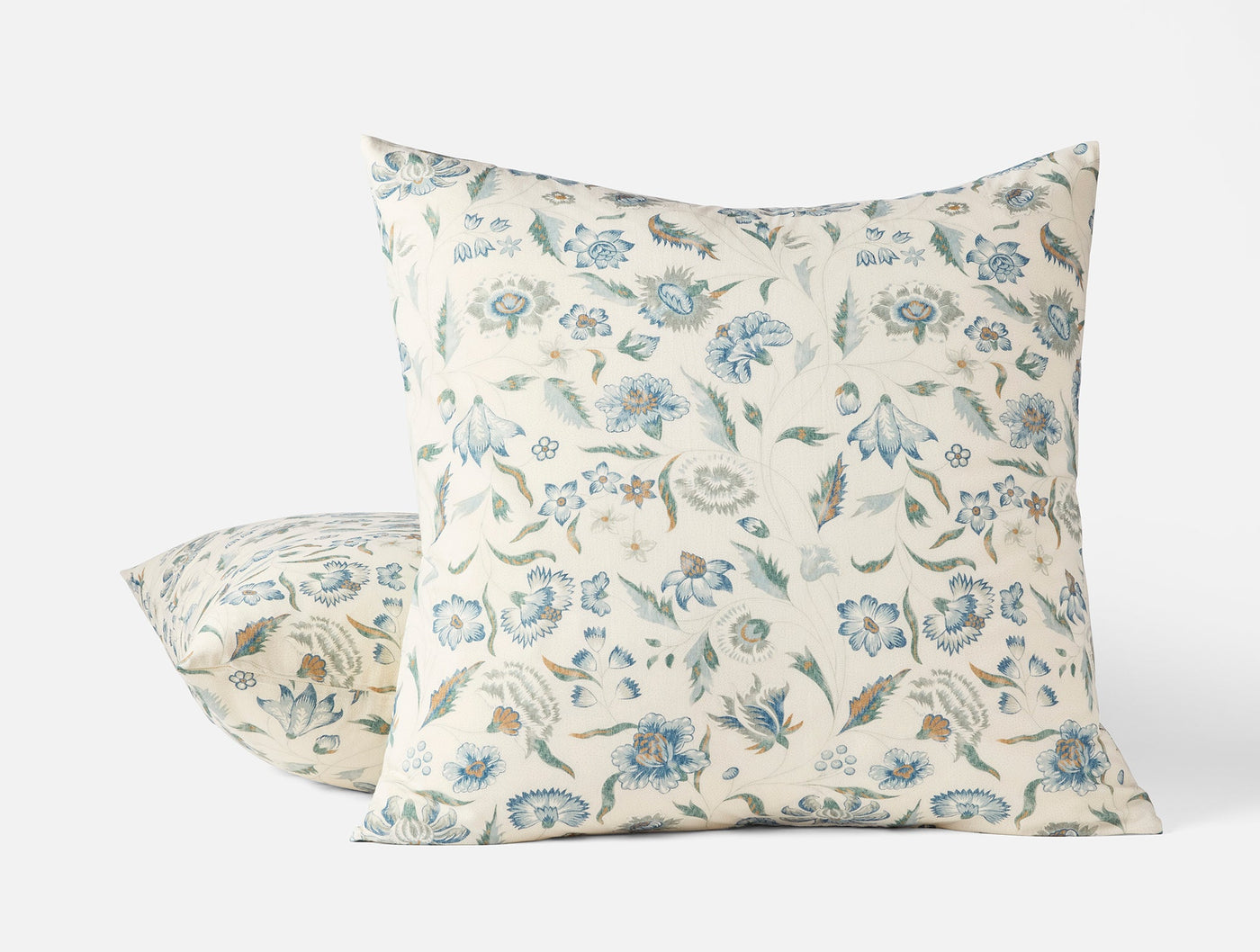 Coyuchi Viola Print pillow sham, ivory linen with blue and green floral print, two sizes shown.