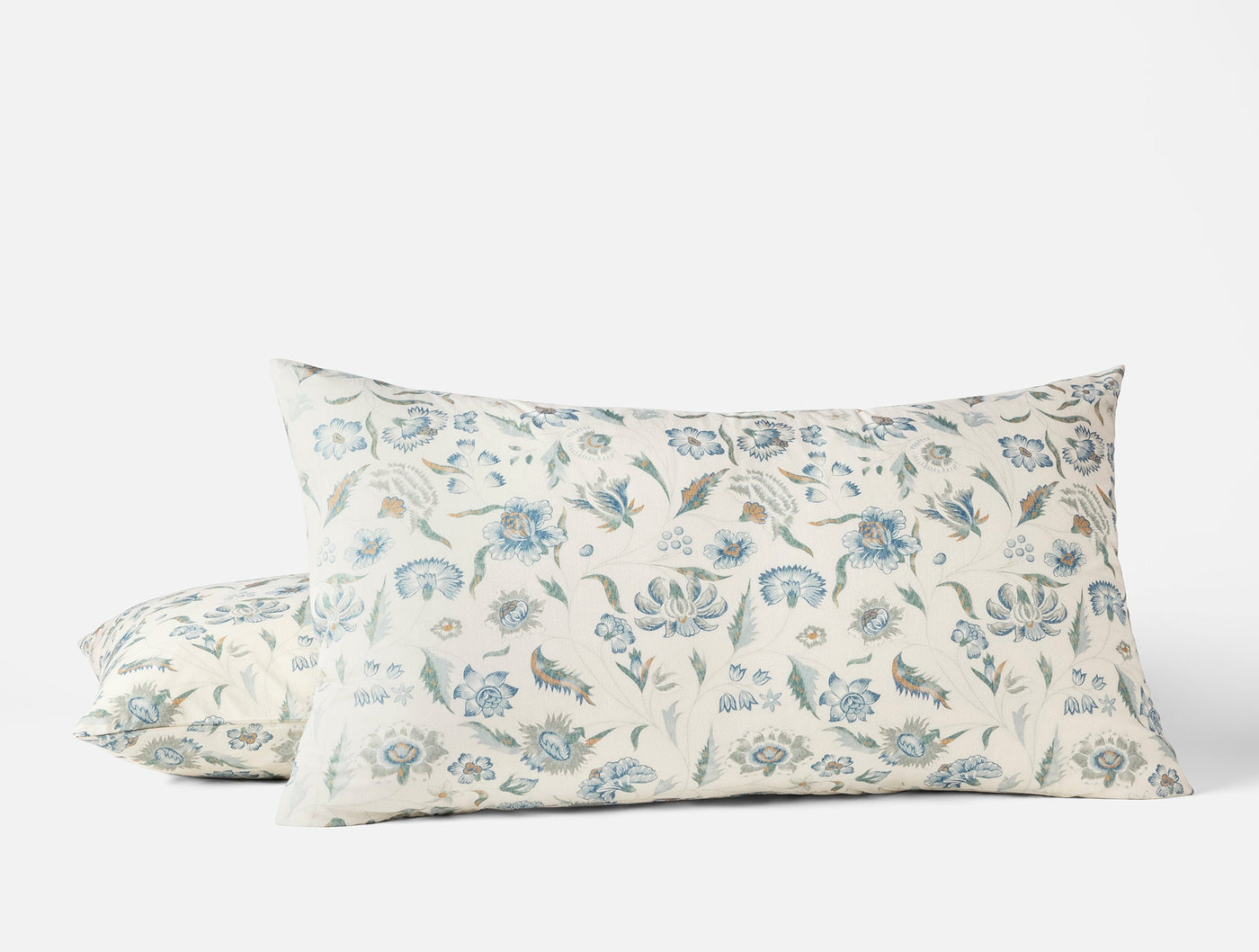 Blue and sage floral print on ivory cotton sham, shown in king and standard sizes.