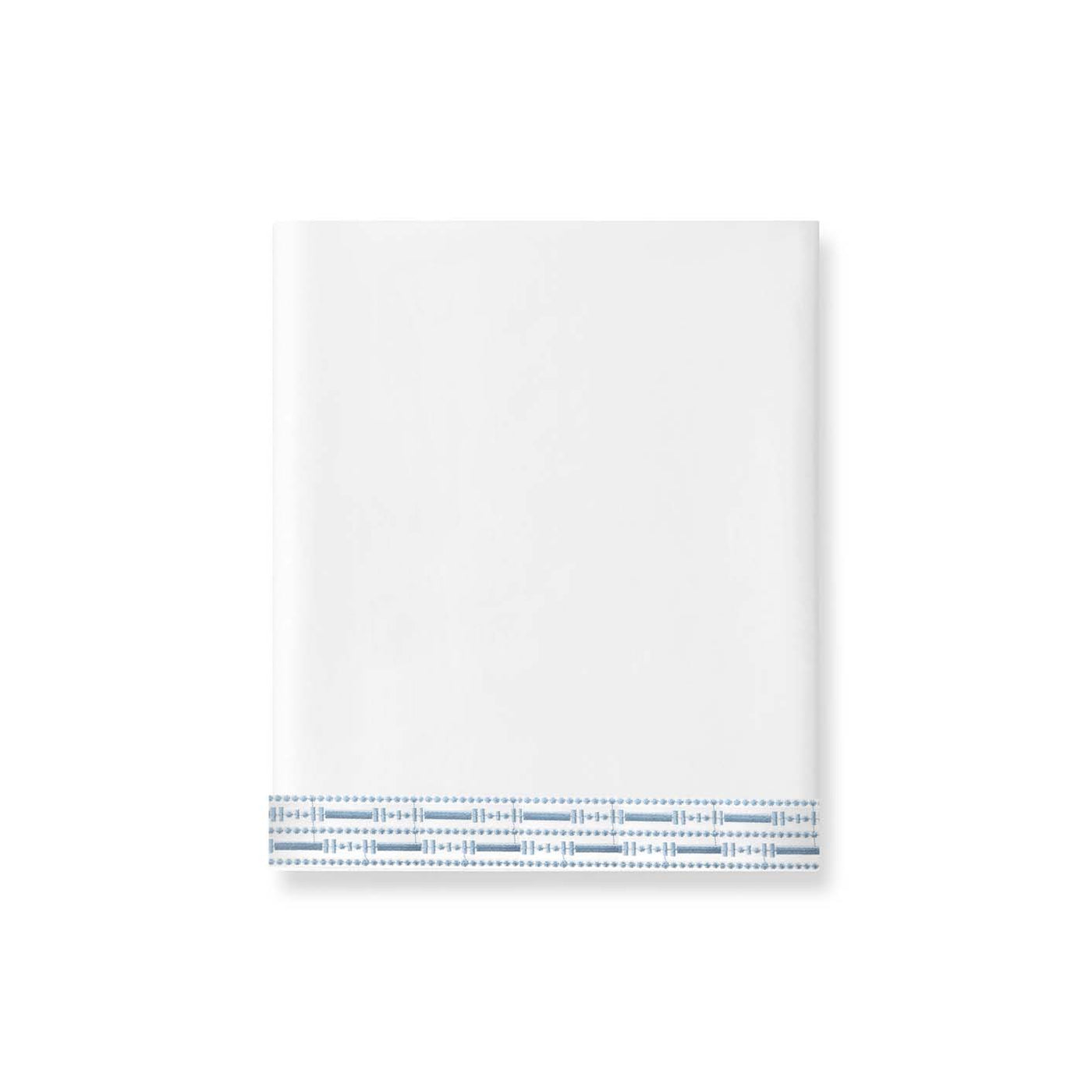 A white napkin inspired by the Memoria Flat Sheet, made in Portugal, is folded into a square with a blue stitched border at the bottom and displayed on a plain white background.