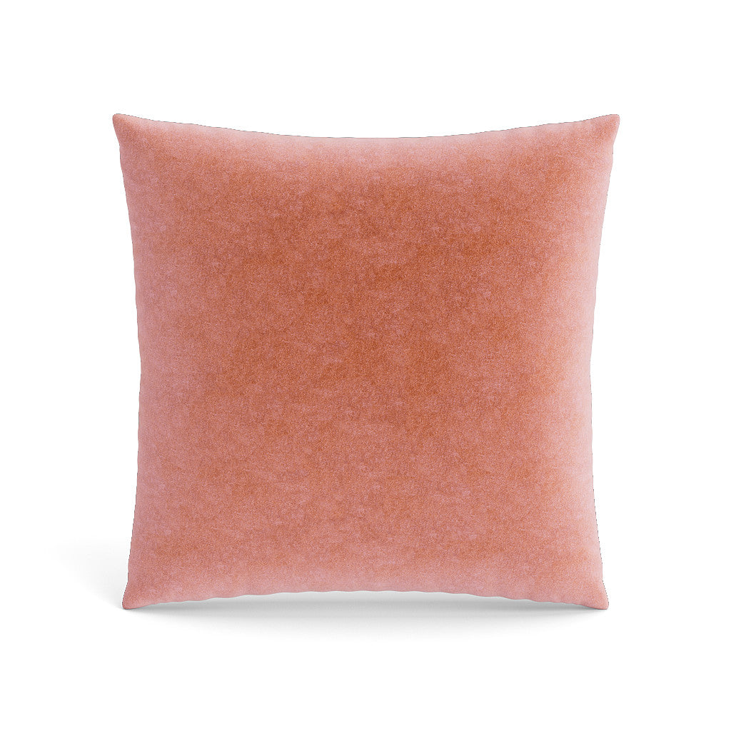 Blush velvet pillow, close-up showing soft plush texture and clean edges.