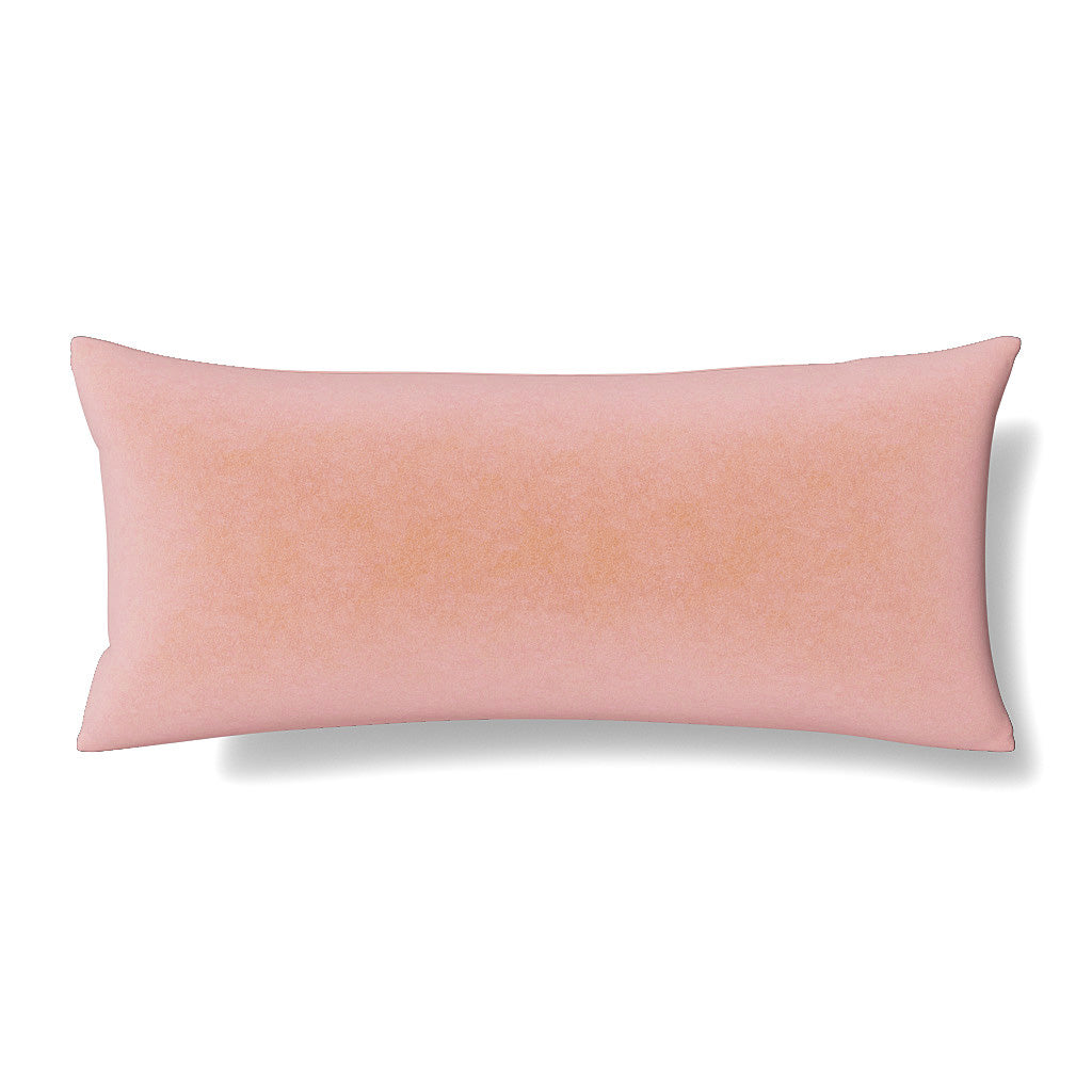 Ann Gish Fresco Velvet lumbar pillow in blush pink velvet, isolated on white.