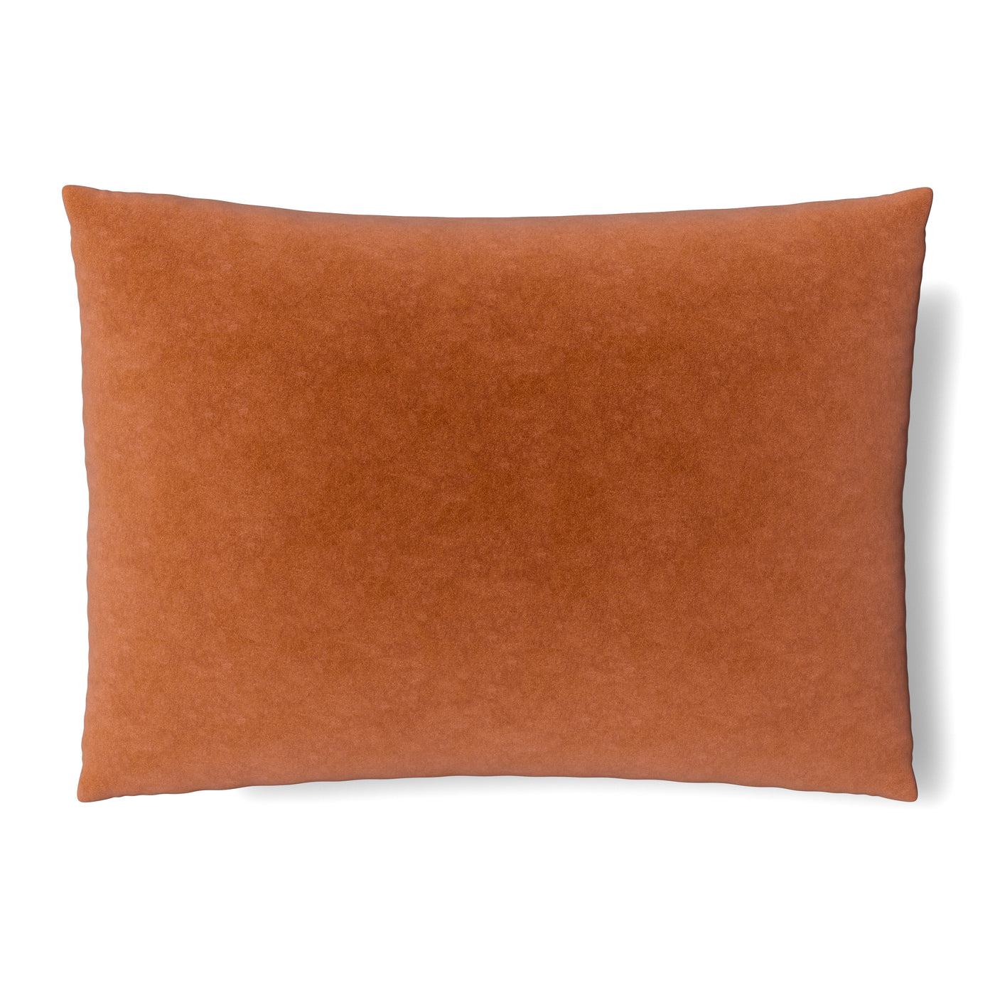 Terracotta velvet sham shown from the front, plump with soft suede-like texture.