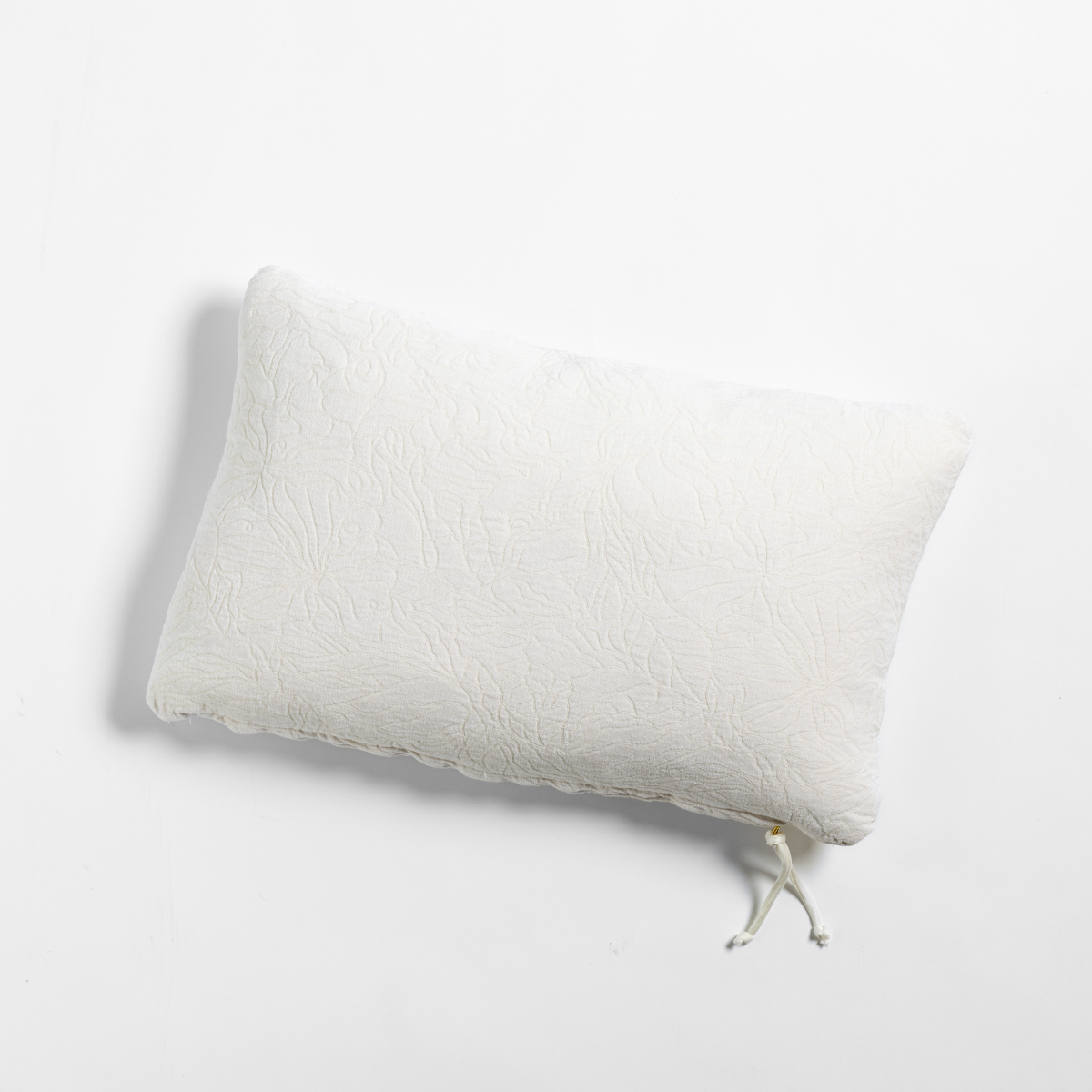 Bella Notte Georgia throw pillow in Natural, rear view showing tassel tie closure.