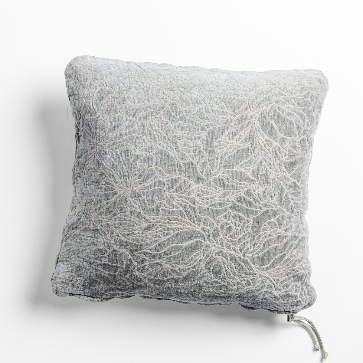 Fog Georgia throw pillow, close-up showing white floral embroidery detail on linen.