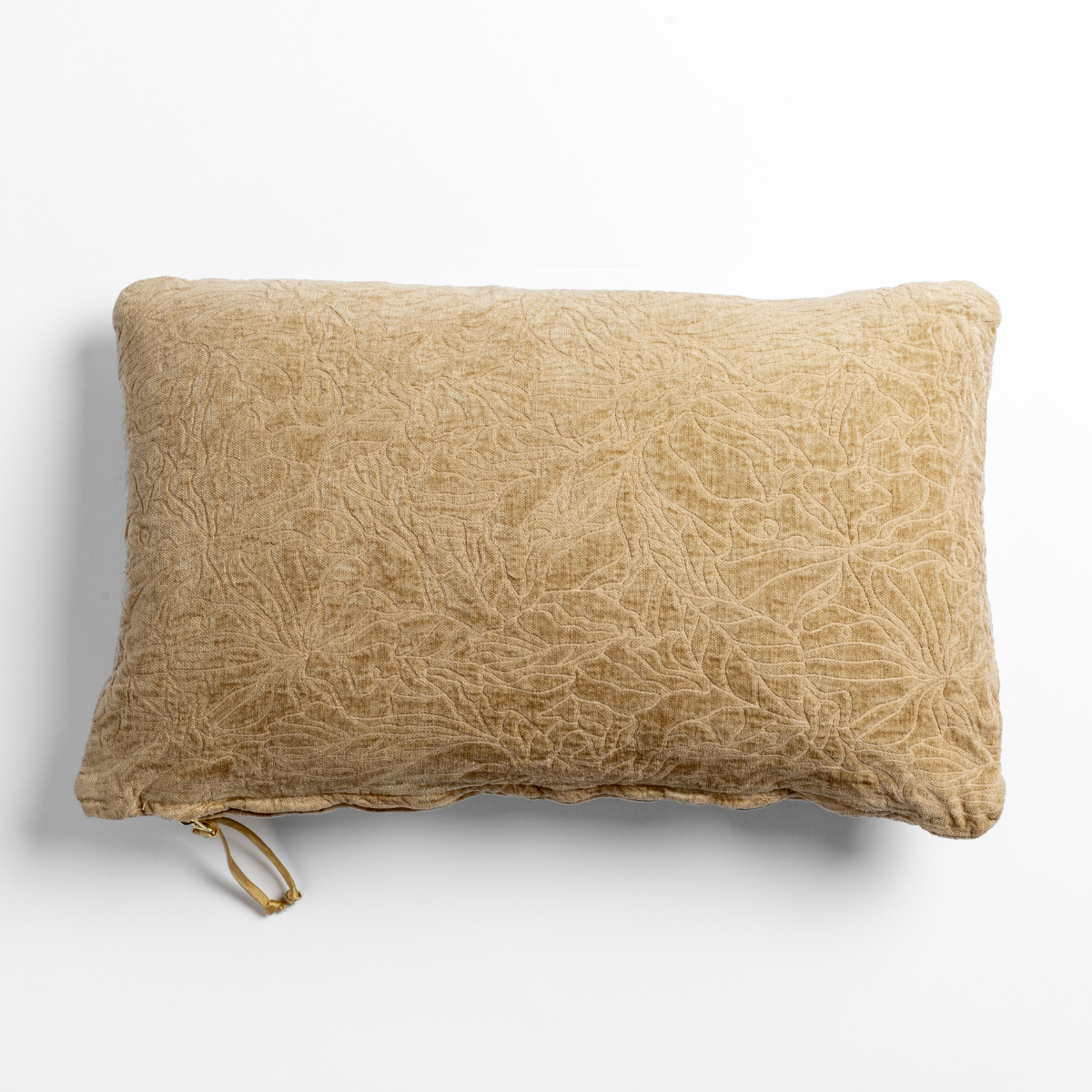 Honeycomb throw pillow back view showing brass zipper closure against white background.
