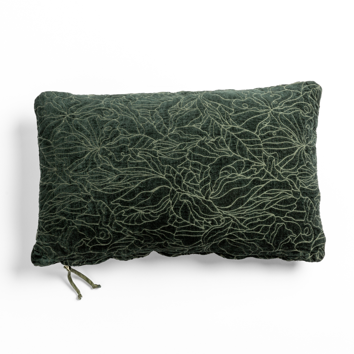 Juniper velvet lumbar pillow with tonal floral embroidery and tassel ties, flat lay view.