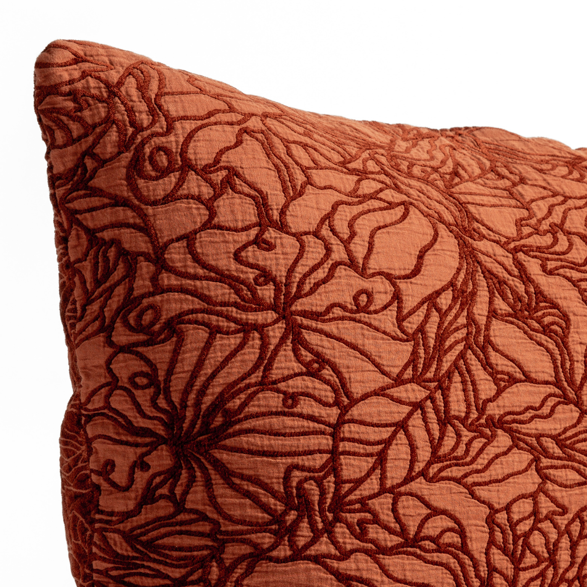 Close-up of Bella Notte Georgia pillow in Autumn, showing embroidered floral outline detail.