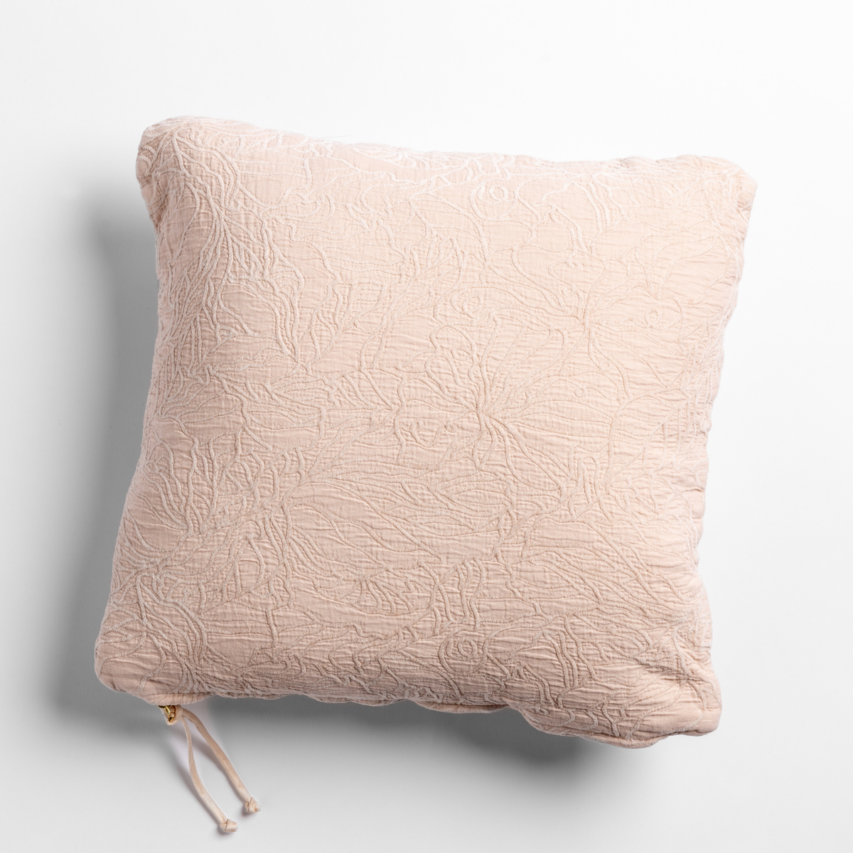 Reverse side of Bella Notte Georgia throw pillow in Pearl, showing zipper closure.