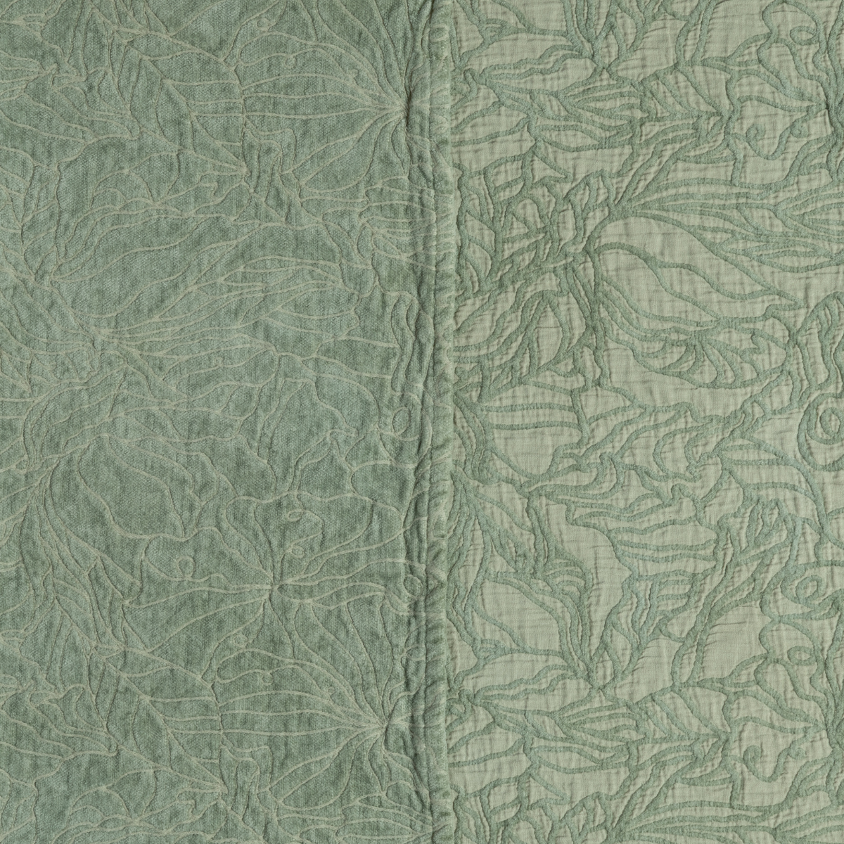 Close-up of Desert Sage Georgia sham showing quilted floral texture and center seam detail.