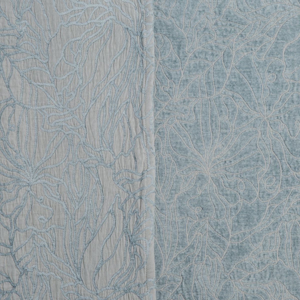 Close-up of Cloud Georgia bedspread showing floral jacquard weave texture and center seam detail.