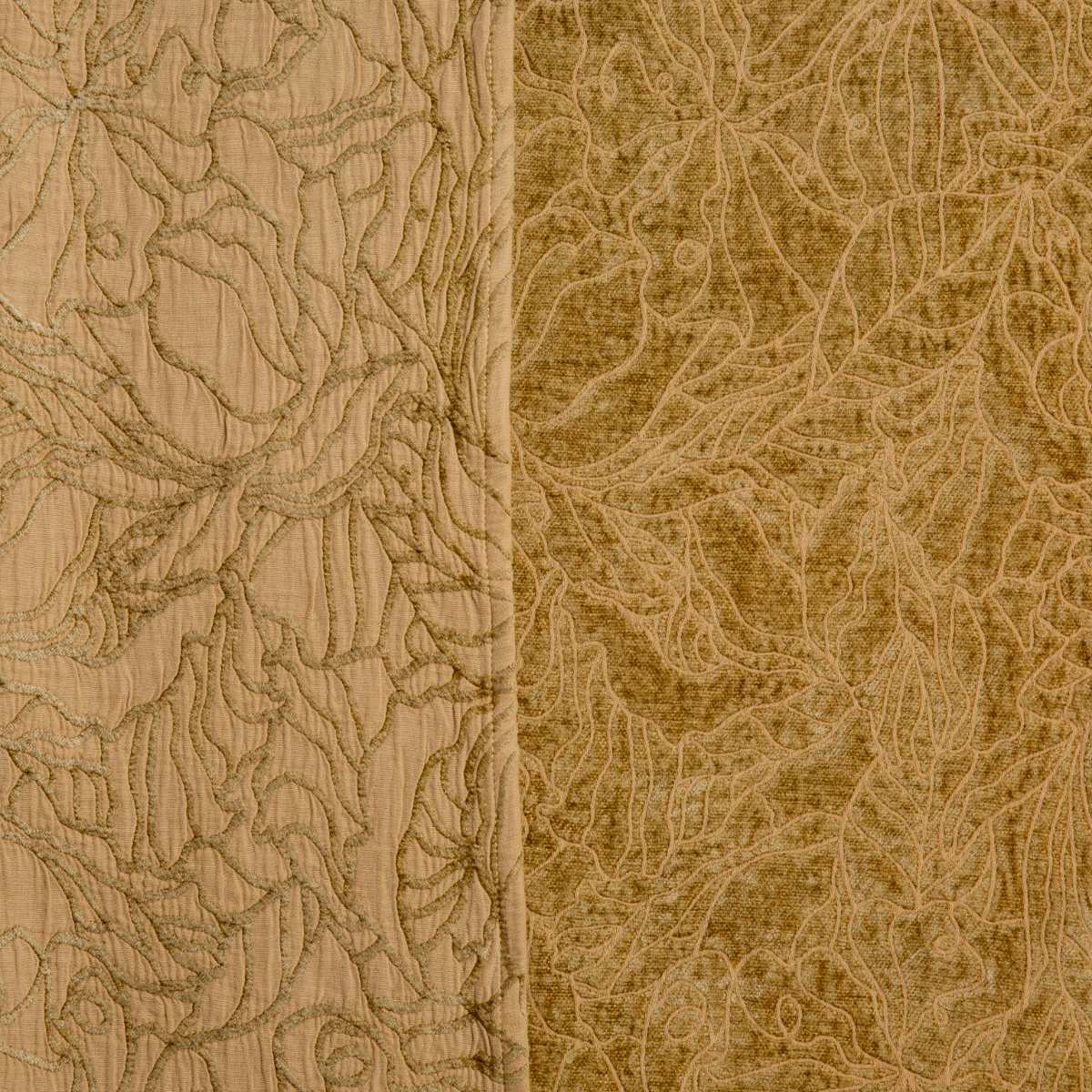 Close-up of Georgia throw pillow in Honeycomb, showing floral quilted texture front and back.