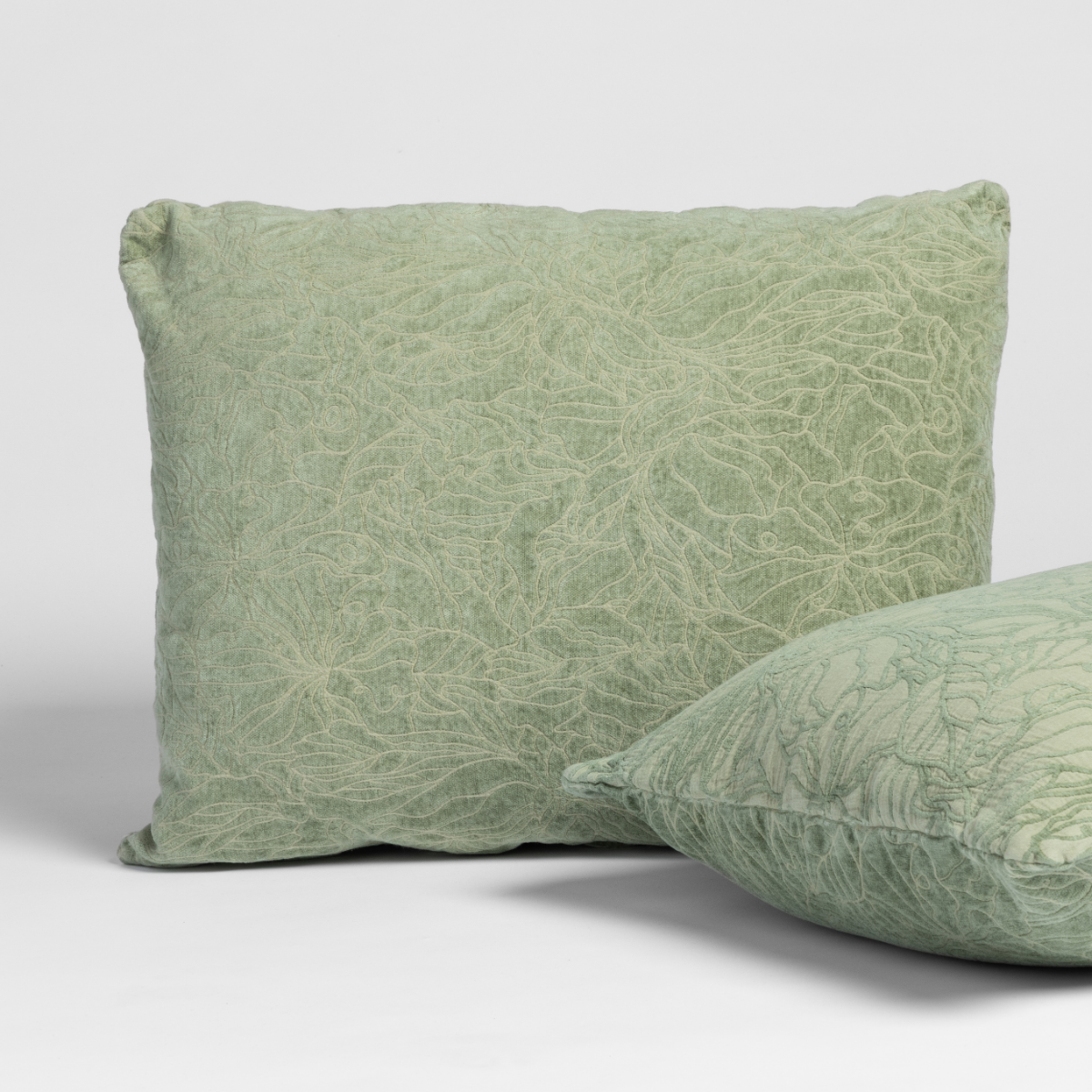 Bella Notte Georgia sham in Desert Sage, close view of delicate embroidered branch pattern.