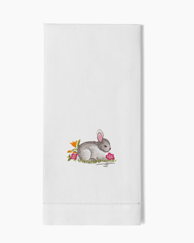 Henry Handwork white linen hand towel with embroidered gray bunny and floral motif.
