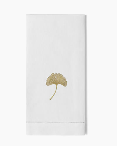 Henry Handwork Ginkgo Gold hand towel in white linen with gold embroidered ginkgo leaf.