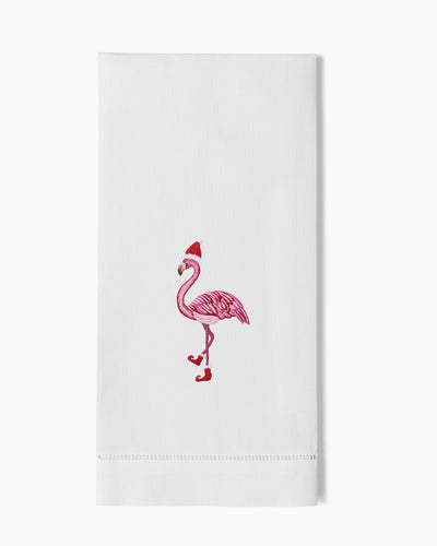 Henry Handwork white linen hand towel with embroidered pink flamingo in Santa hat and boots.